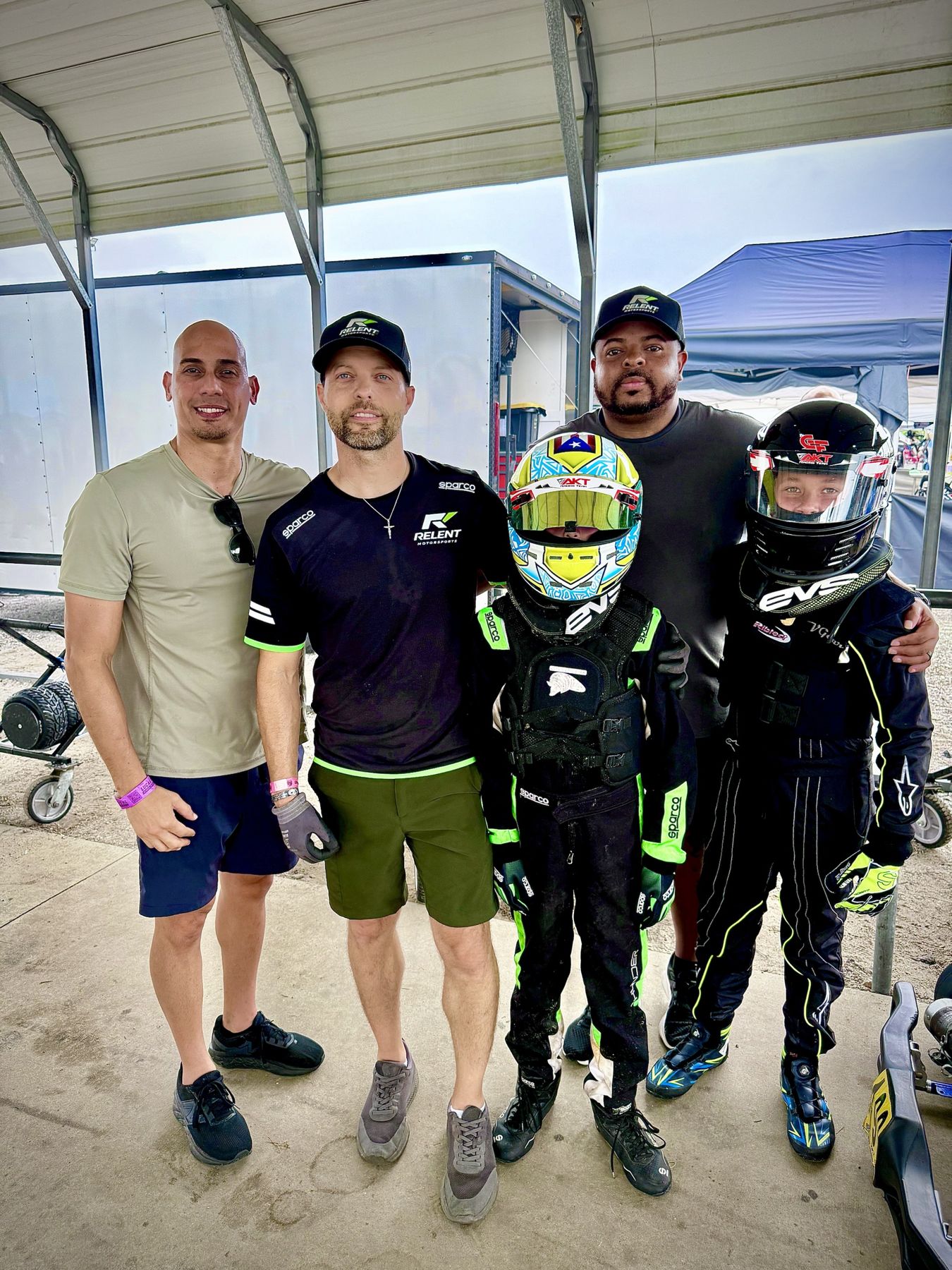 Relent crew with young drivers in the karting paddock